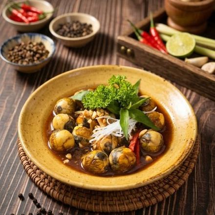 Cút lộn xào me